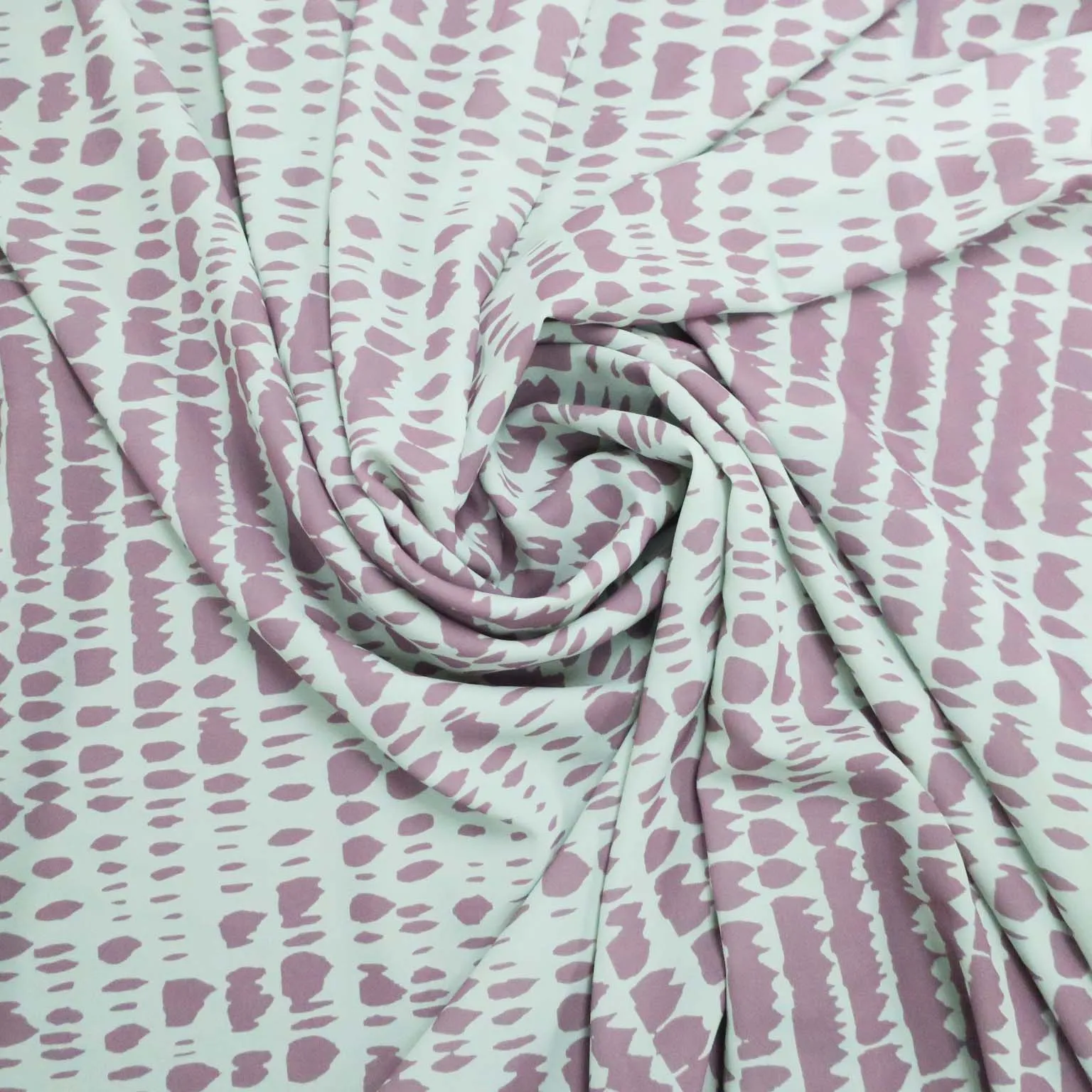 Alligator Blush and White Background Crepe Polyester Fabric